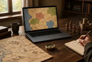 Ordinateur affichant une carte stratégique médiévale entouré d’un parchemin, de figurines en bois et d’accessoires historiques sur une table.